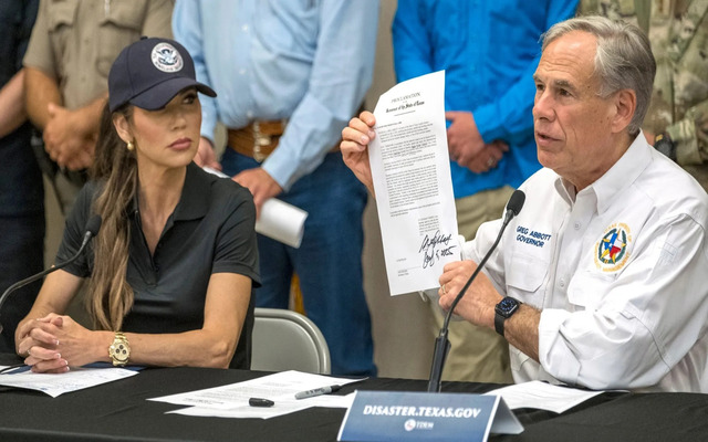  Texas Gov. Greg Abbott, right, signed a disaster declaration proclamation on Saturday