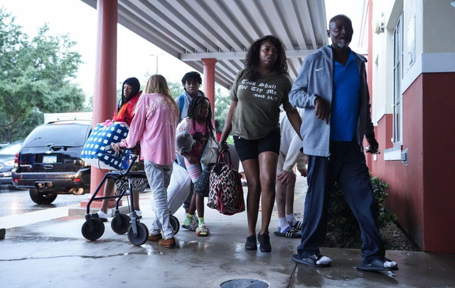 People move to a safer place before the devastating hurricane hits