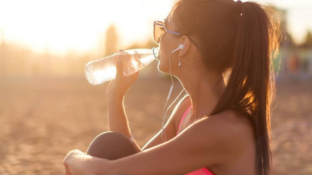 Drink plenty of water when tanning