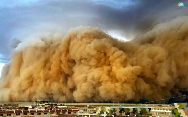 A dust storm hit a village in Golmud in Qinghai Province (China)